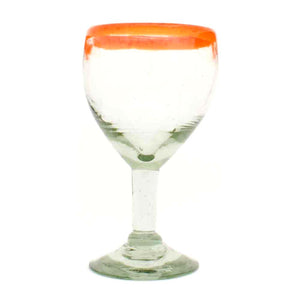 Clear with a milky orange rim wine glass