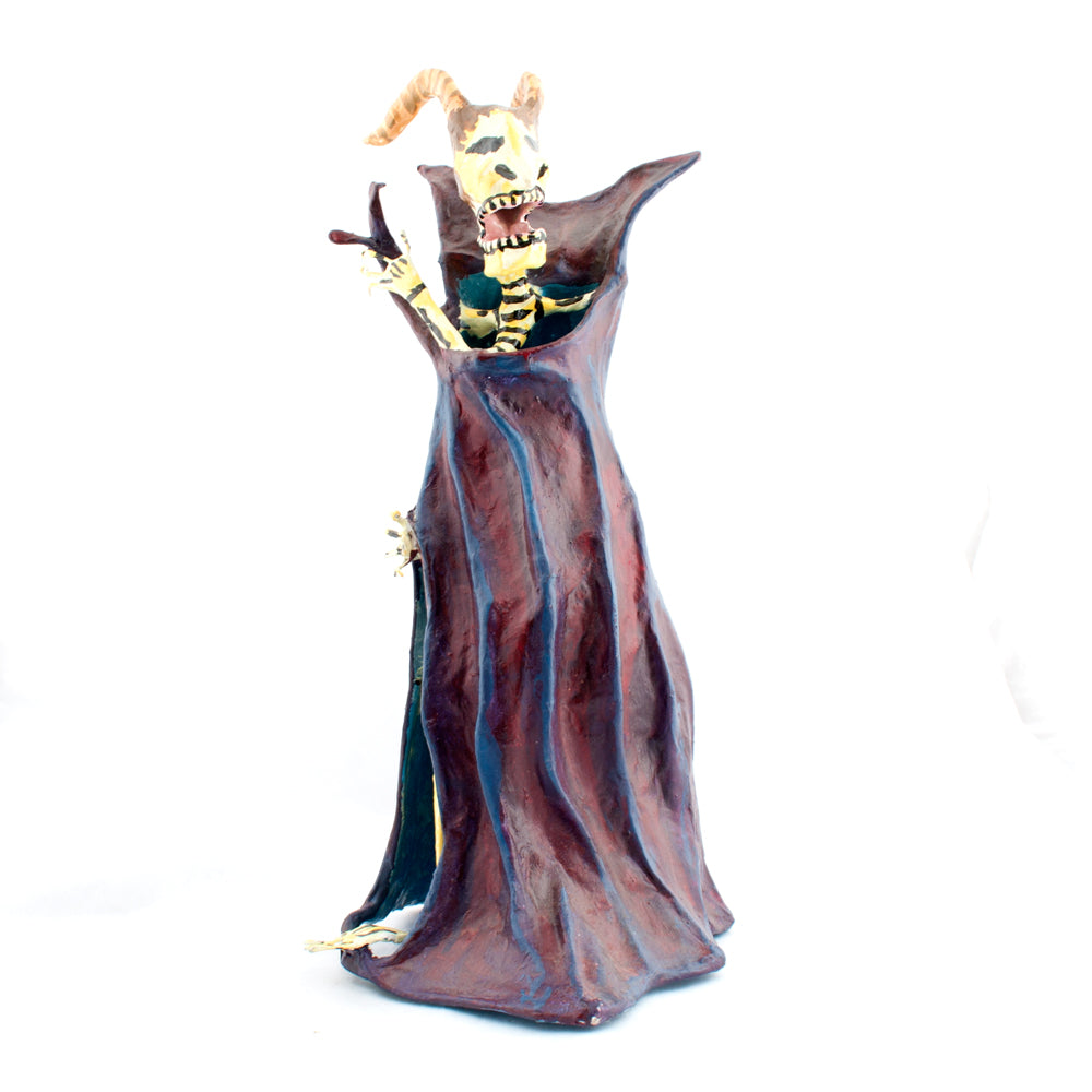 Paper Mache devil in a cloak by Saulo Moreno